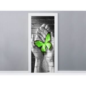 Gario Samolepící fólie na dveře Zelený motýl v dlaních 95x205cm