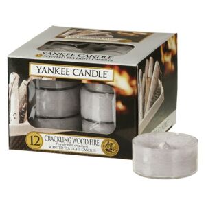 Yankee Candle - čajové svíčky Crackling Wood Fire 12ks (Praskající oheň. Hřejivá vůně hořícího cedrového dřeva je doprovázena sladkým šepotem muškátového oříšku a ambry...)