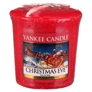 Yankee Candle - votivní svíčka Christmas Eve 49g (Štědrý večer. Tradiční vánoční vůně, plná vřelých srdcí, rozinek a kandovaného ovoce.)