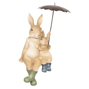 Táta zajíc s malým zajíčkem pod deštníkem